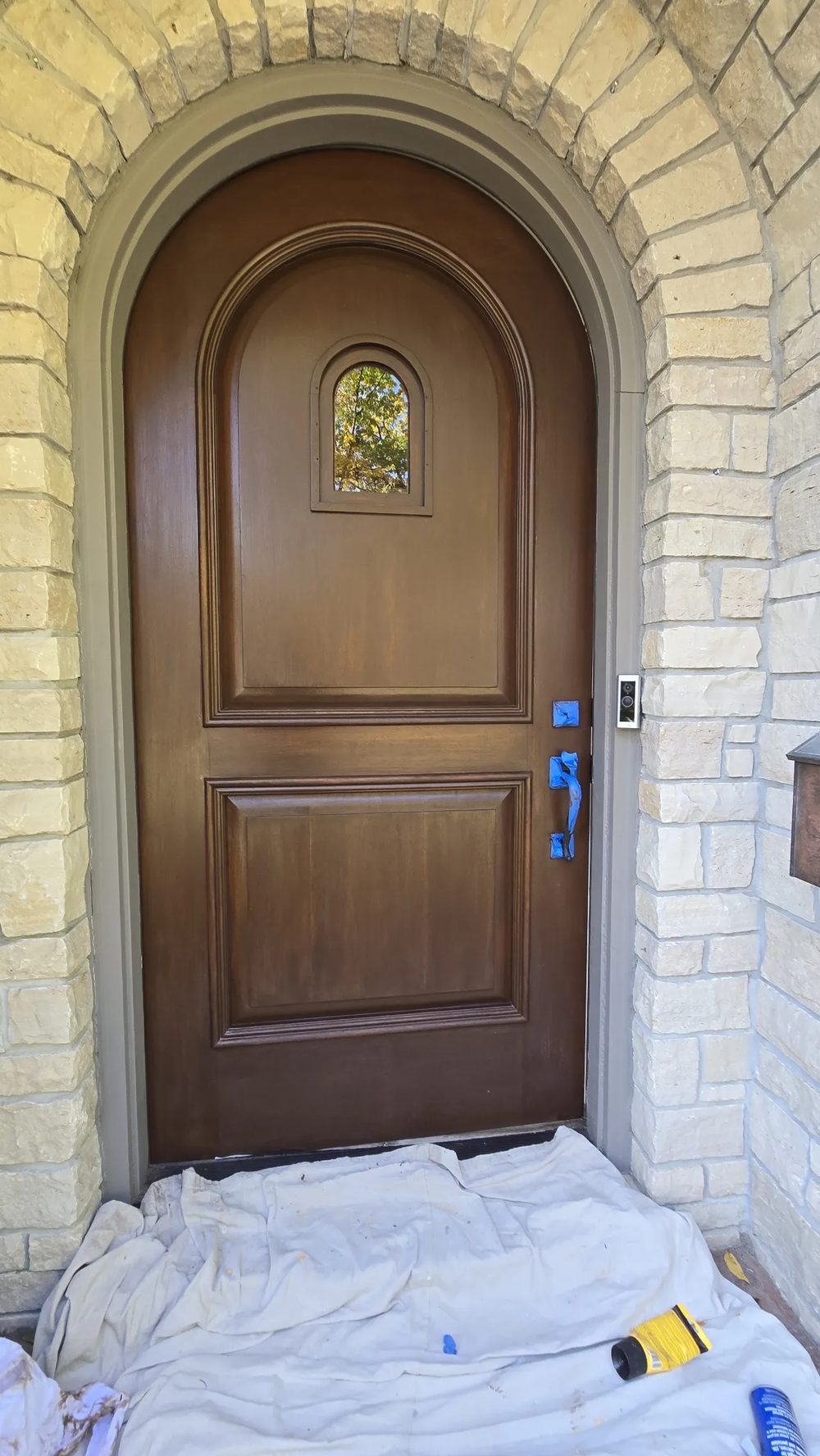 Arched entry door after staining and refinishing, Des Plaines IL