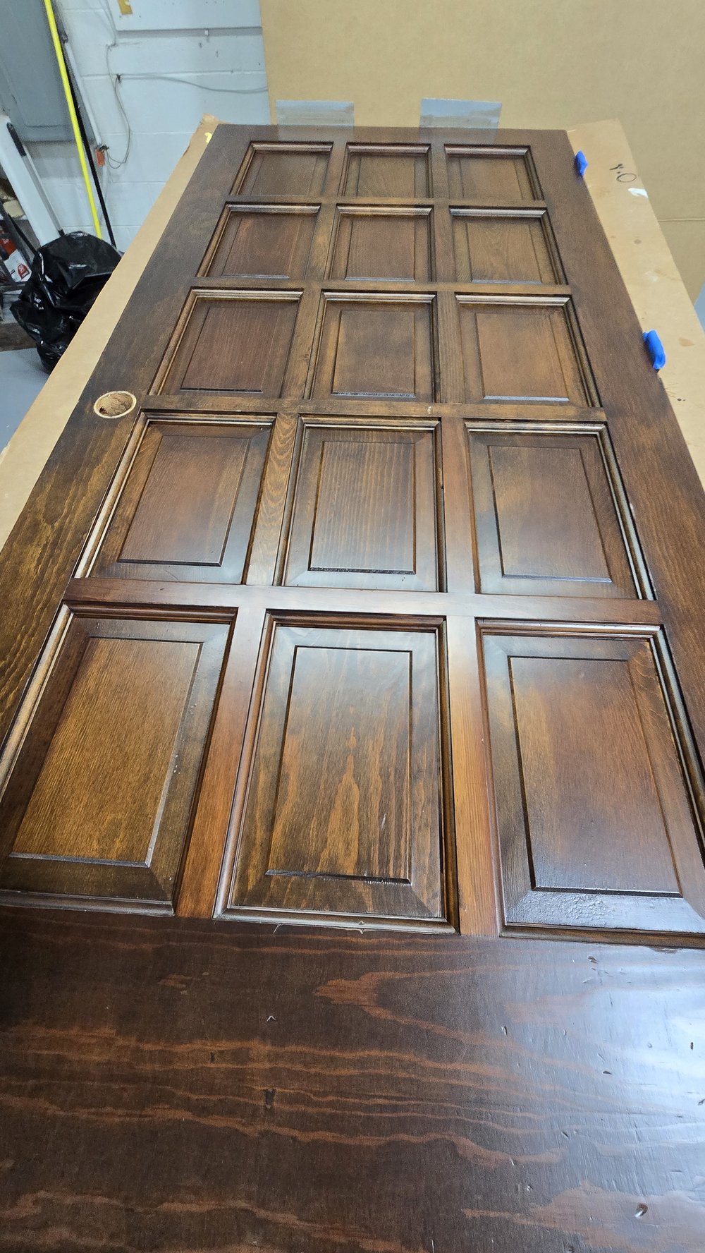 15-panel wood door after staining and refinishing, Des Plaines IL